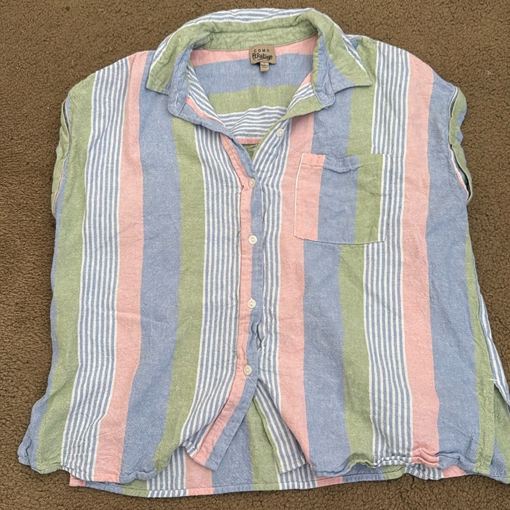 blue, green, and pink stripped shirt